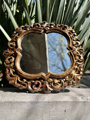 Espejo marco tallado